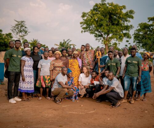 Group photo with cocoa farmers and the Elucid team